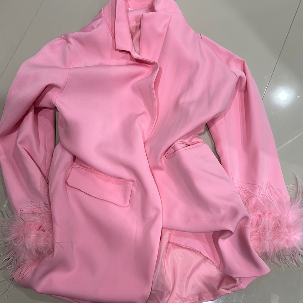 Pink blazer with feathers